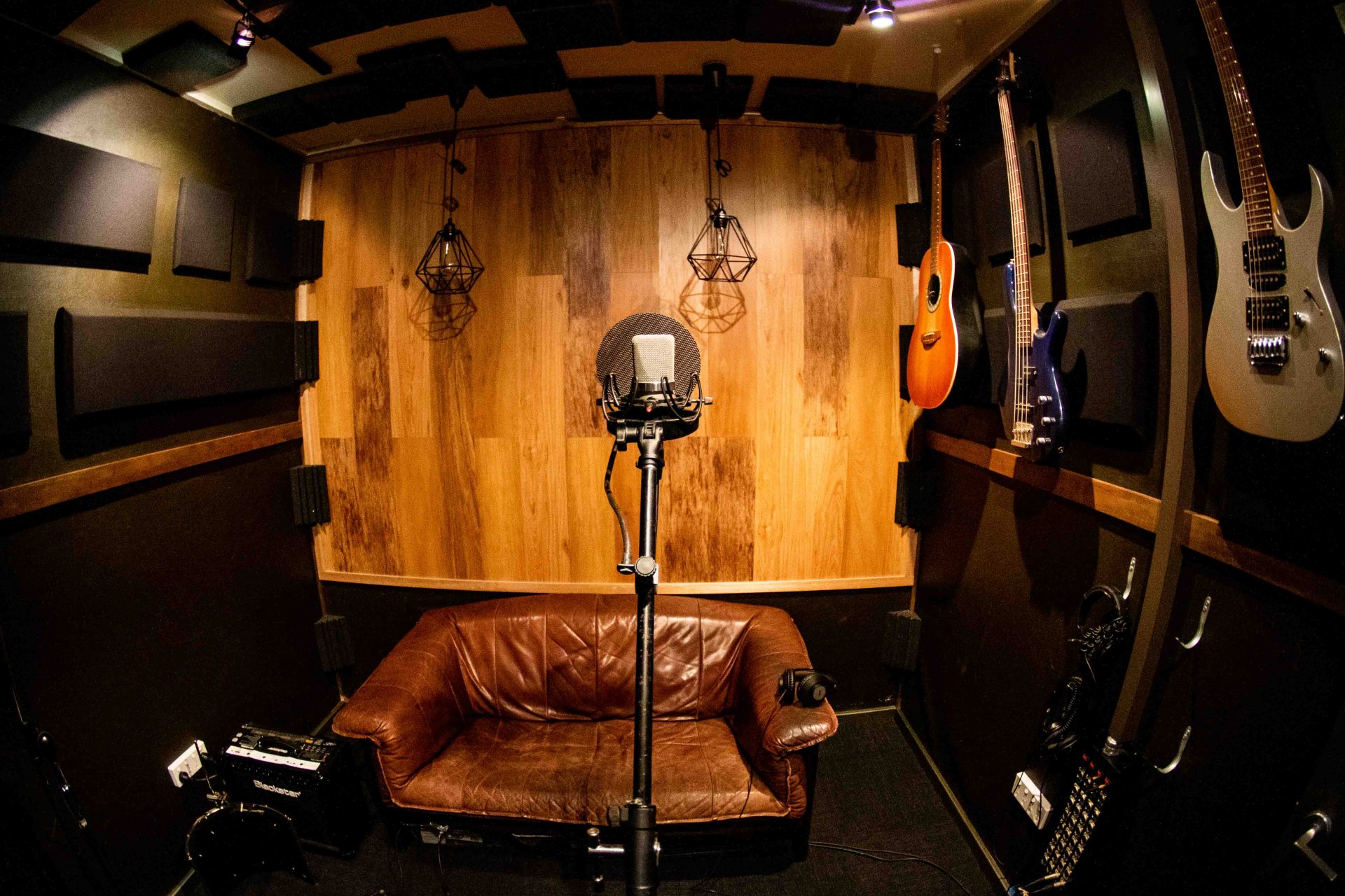 Guitarist Performing in Sound Booth